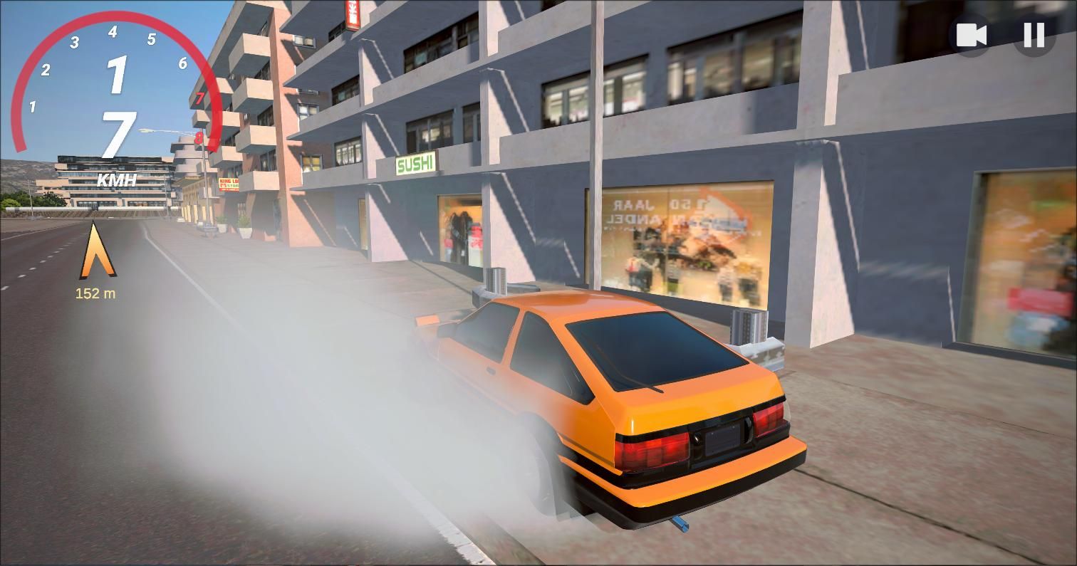 The orange AE86 sliding down an Ocean City street with tyre smoke pouring off the rear wheels